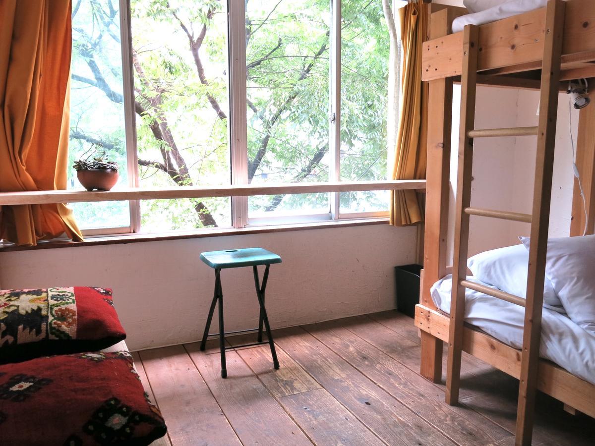 Отель Tani9 Backpackers Осака Экстерьер фото