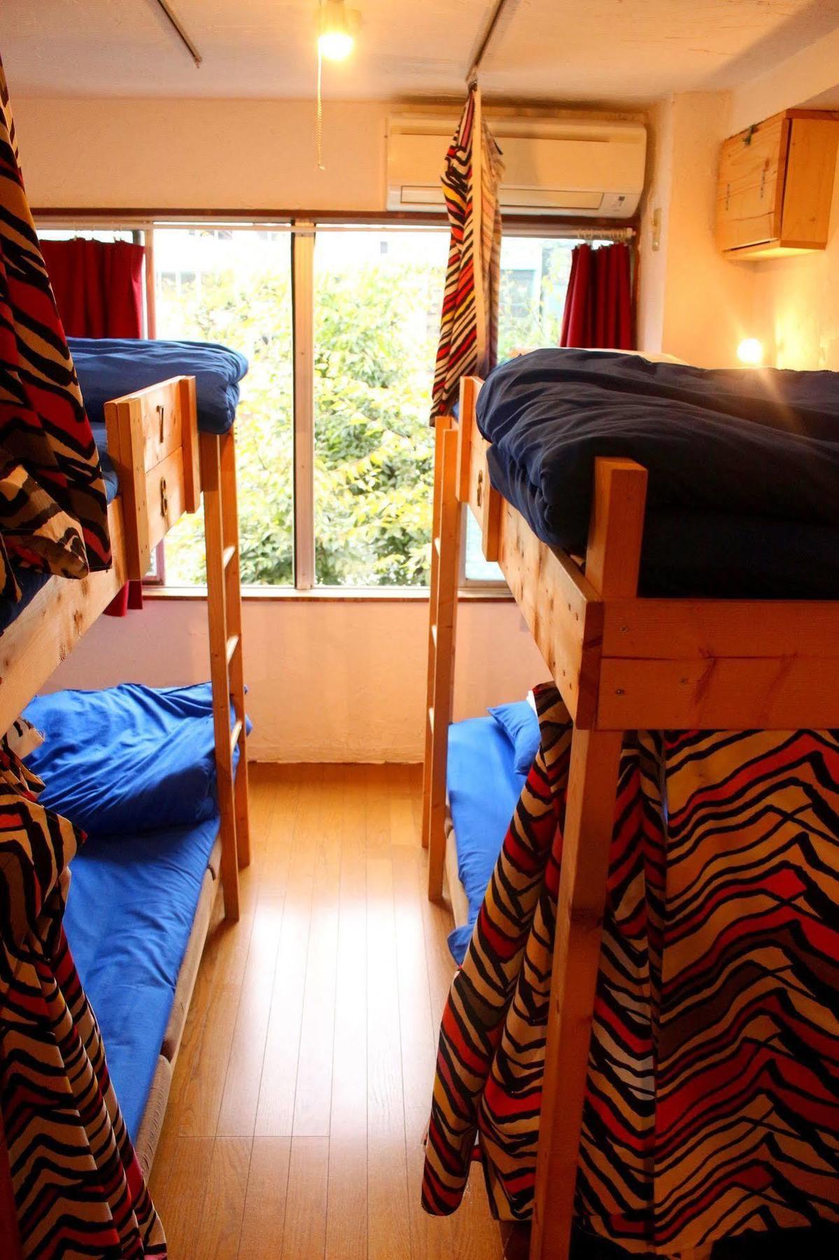 Отель Tani9 Backpackers Осака Экстерьер фото
