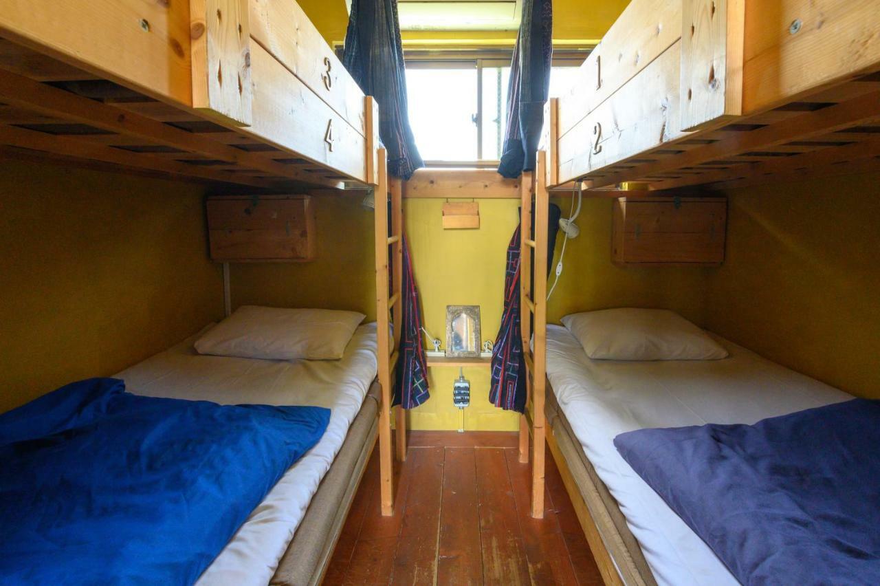 Отель Tani9 Backpackers Осака Экстерьер фото