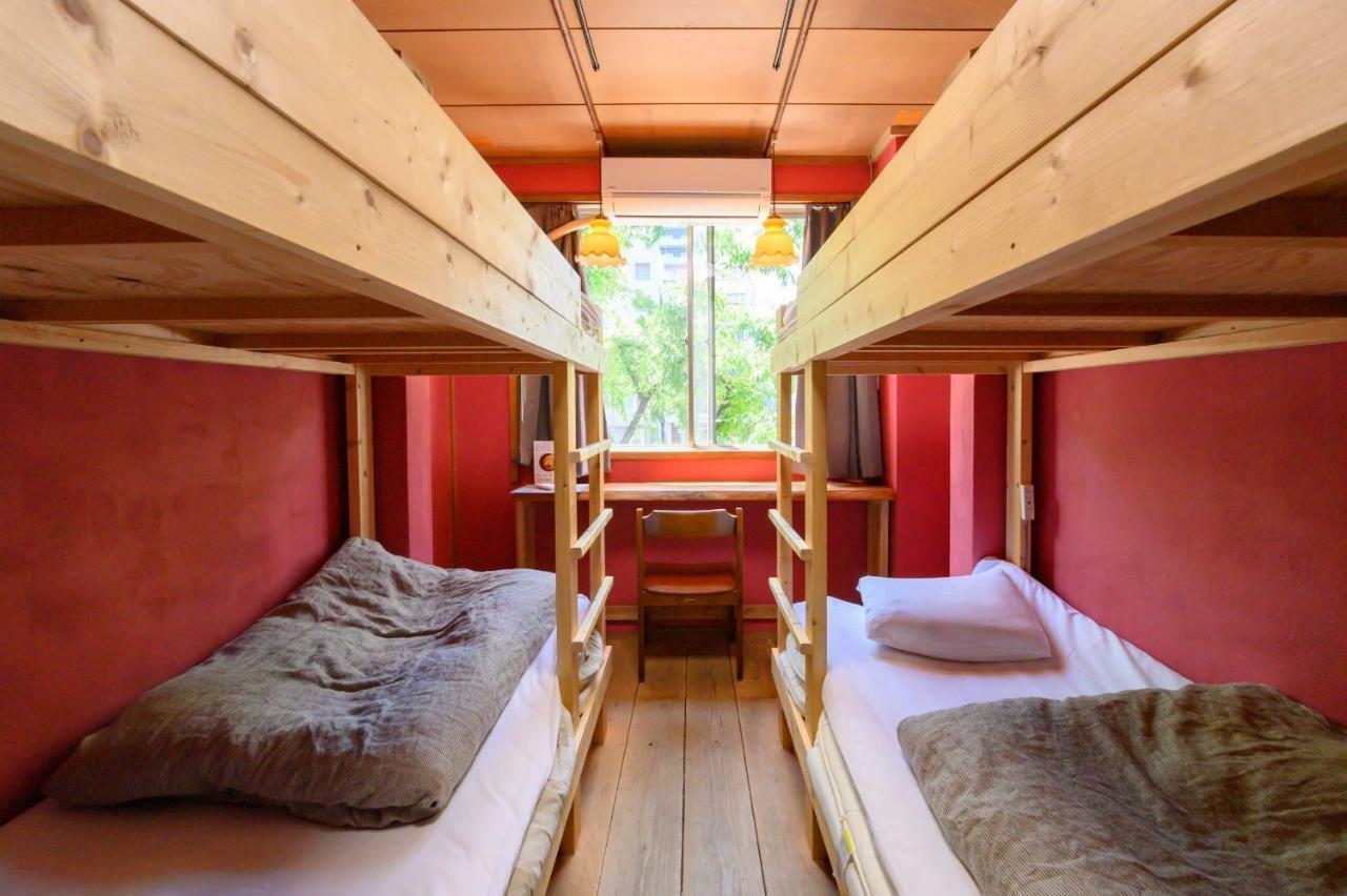 Отель Tani9 Backpackers Осака Экстерьер фото